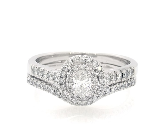 Previously Owned Oval-Cut Diamond Double Halo Bridal Set 5/8 ct tw 14K White Gold 7.75