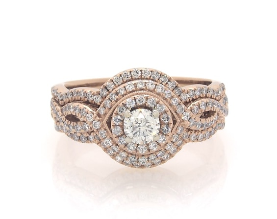 Previously Owned Round-Cut Diamond Halo Twist Bridal Set 7/8 ct tw 14K Rose Gold Size 7