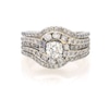 Thumbnail Image 1 of Previously Owned Round-Cut Diamond Halo Bridal Set 1-5/8 ct tw 14K Two-Tone Gold Size 7