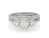 Thumbnail Image 1 of Previously Owned Round-Cut Diamond Three-Stone Halo Bridal Set 1-1/5 ct tw 14K White Gold Size 6