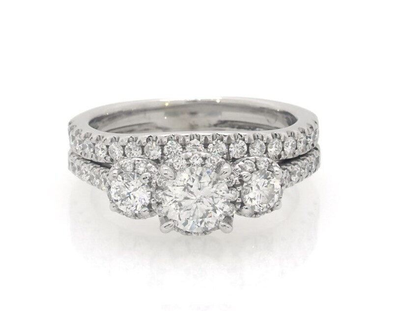 Main Image 1 of Previously Owned Round-Cut Diamond Three-Stone Halo Bridal Set 1-1/5 ct tw 14K White Gold Size 6