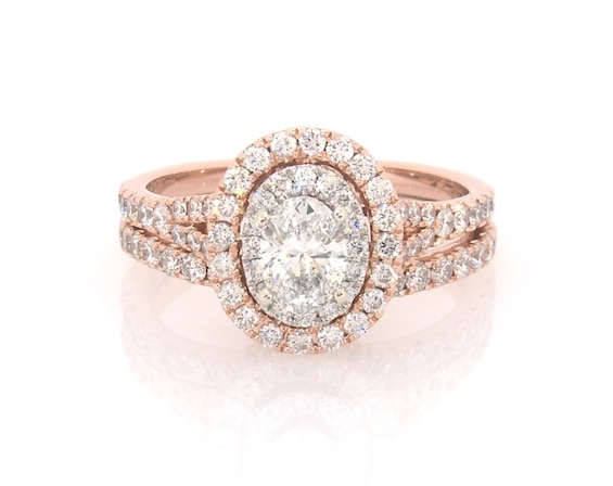 Previously Owned Neil Lane Oval-Cut Diamond Halo Bridal Set 1-1/2 ct tw 14K Two-Tone Gold Size 7