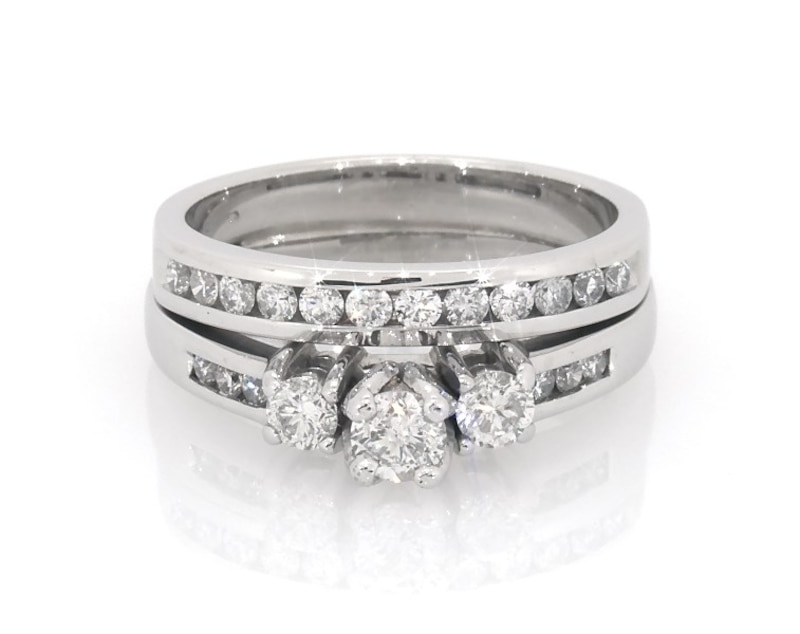 Main Image 1 of Previously Owned Round-Cut Diamond Three-Stone Bridal Set 5/8 ct tw 14K White Gold Size 8