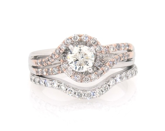 Previously Owned Round-Cut Diamond Bypass Halo Bridal Set 1-1/5 ct tw 14K Two-Tone Gold Size 6.75