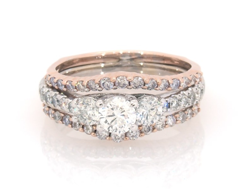 Main Image 1 of Previously Owned Round-Cut Diamond Three-Stone Bridal Set 1-3/8 ct tw 14K Two-Tone Gold Size 7