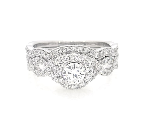 Previously Owned Neil Lane Round-Cut Diamond Halo Bridal Set 1-1/6 ct tw 14K White Gold Size 6.5