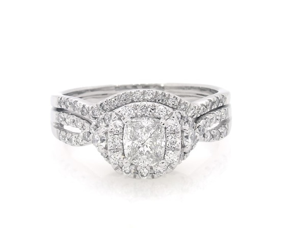 Previously Owned Pie-Cut Multi-Diamond Halo Bridal Set 7/8 ct tw 14K White Gold 8.75