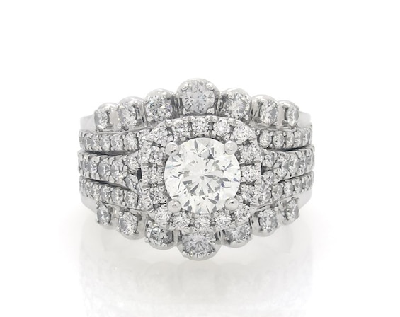 Previously Owned THE LEO Diamond Round-Cut Halo Bridal Set 2-1/3 ct tw 14K White Gold Size 5.5