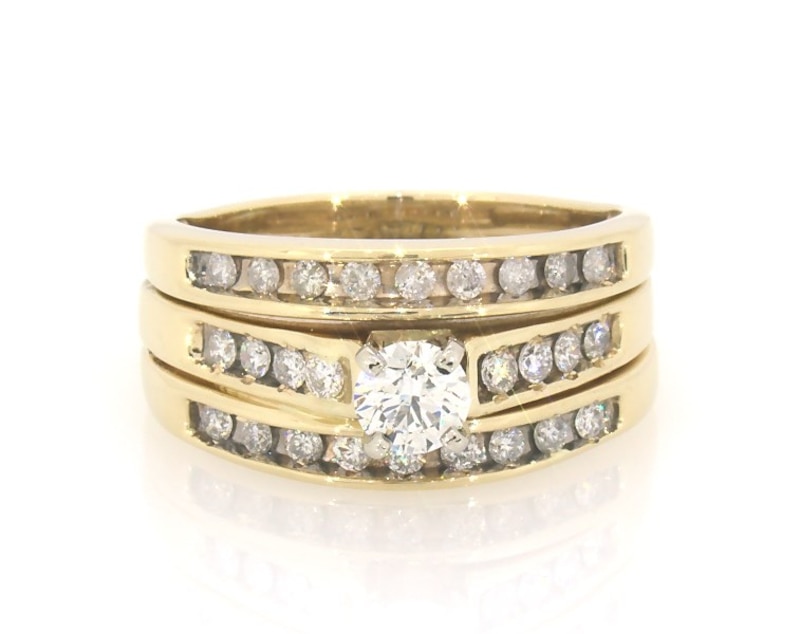 Main Image 1 of Previously Owned Round-Cut Diamond Bridal Set 5/8 ct tw 14K Yellow Gold Size 7.25
