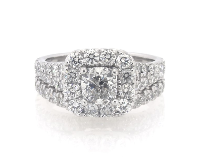 Main Image 1 of Previously Owned Neil Lane Cushion-Cut Diamond Halo Bridal Set 2-1/2 ct tw 14K White Gold Size 5.75