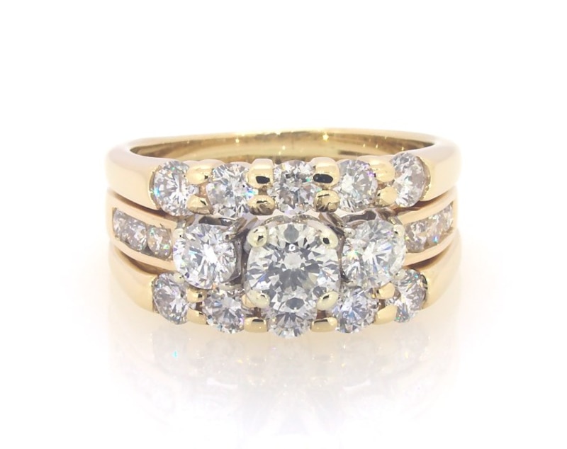 Main Image 1 of Previously Owned Round-Cut Diamond Three-Stone Bridal Set 2 ct tw 14K Two-Tone Gold Size 6.25