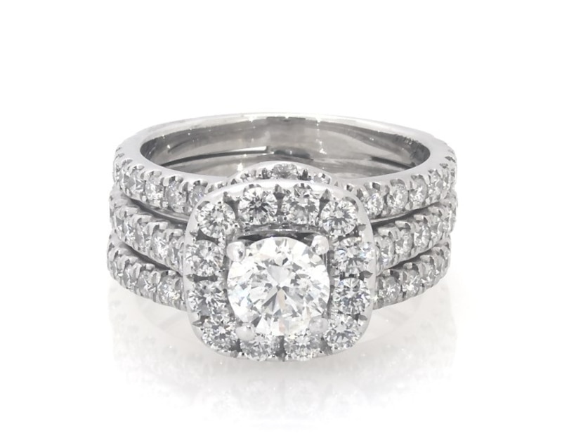 Main Image 1 of Previously Owned Neil Lane Round-Cut Diamond Halo Bridal Set 2-1/6 ct tw 14K White Gold Size 5.5