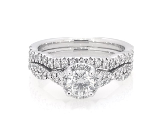 Previously Owned Round-Cut Diamond Halo Twist Shank Bridal Set 7/8 ct tw 14K White Gold Size 5.25