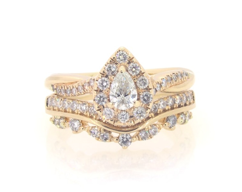 Main Image 1 of Previously Owned Pear-Shaped Diamond Halo Bridal Set 5/8 ct tw 14K Yellow Gold Size 3.75