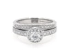 Thumbnail Image 1 of Previously Owned Round-Cut Diamond Halo Bridal Set 3/4 ct tw 14K White Gold Size 6.25