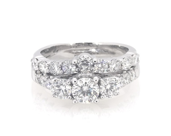 Previously Owned THE LEO Diamond Round-Cut Three-Stone Bridal Set 1-3/8 ct tw 14K White Gold Size 5