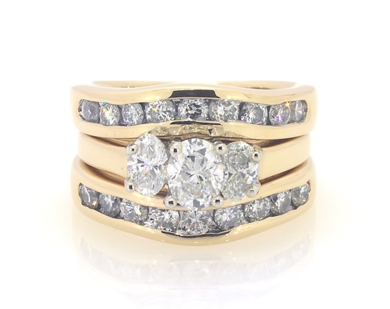 Previously Owned Oval-Cut Diamond Three-Stone Bridal Set 1-7/8 ct tw 14K Yellow Gold & Platinum Size 5.25