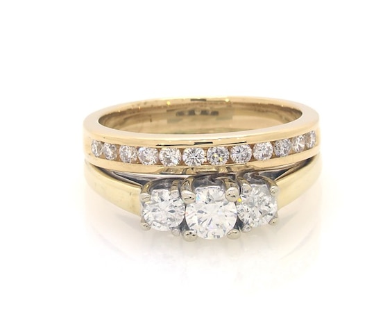 Previously Owned Round-Cut Diamond Three-Stone Bridal Set 5/8 ct tw 14K Two-Tone Gold 5.75