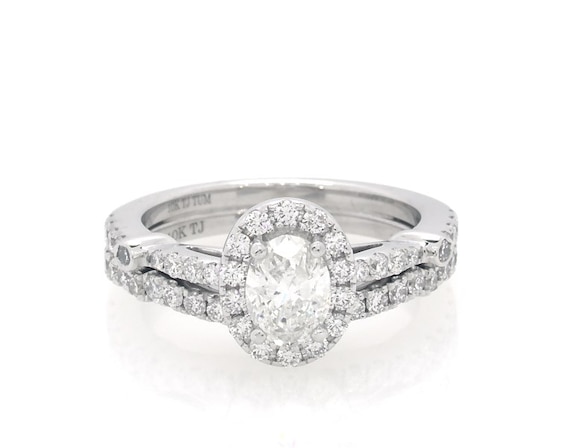 Previously Owned Oval-Cut Diamond Halo Bridal Set 7/8 ct tw 10K White Gold Size 4.5