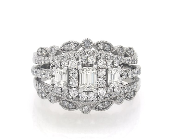Previously Owned Emerald-Cut Diamond Three-Stone Halo Bridal Set 1-1/4 ct tw 14K White Gold 6.75
