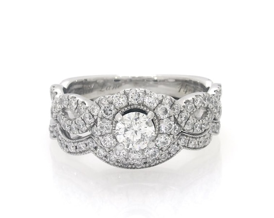 Previously Owned Neil Lane Round-Cut Diamond Halo Bridal Set 1-1/5 ct tw 14K White Gold Size 7.75