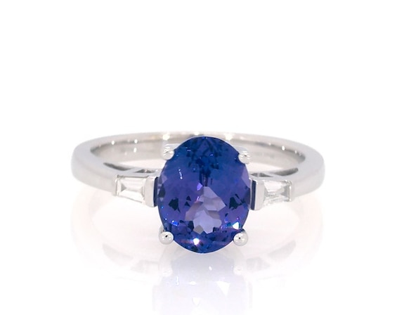 Previously Owned Oval-Cut Tanzanite & Baguette Diamond Ring 1/10 ct tw 10K White Gold