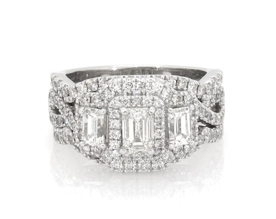 Previously Owned Neil Lane Emerald-Cut Diamond Three-Stone Halo Bridal Set 1-7/8 ct tw 14K White Gold Size 4