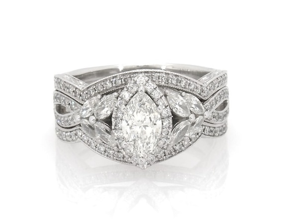 Previously Owned Neil Lane Marquise-Cut Diamond Halo Bridal Set 1-5/8 ct tw 14K White Gold Size 7.75