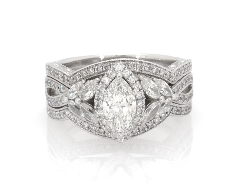 Main Image 1 of Previously Owned Neil Lane Marquise-Cut Diamond Halo Bridal Set 1-5/8 ct tw 14K White Gold Size 7.75