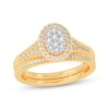 Thumbnail Image 1 of Now + Forever Round-Cut Multi-Diamond Center Oval-Frame Bridal Set 1/2 ct tw 10K Yellow Gold