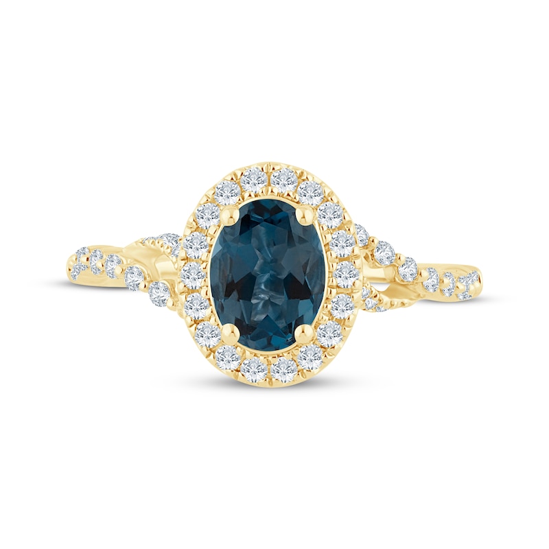 Oval-Cut London Blue Topaz & Diamond Halo Twist Shank Engagement Ring 1/2 ct tw 14K Yellow Gold